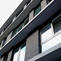 Handelsruimte en 12 appartementen Leuven